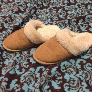 Brown and  white slippers